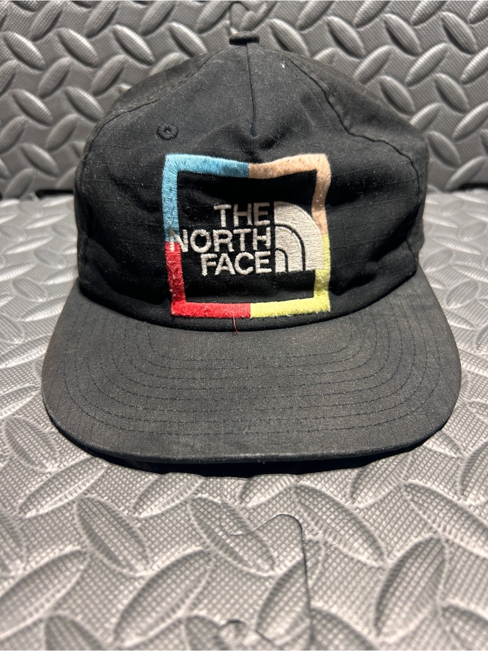 The North Face Black Cap with Multicolor Square Logo